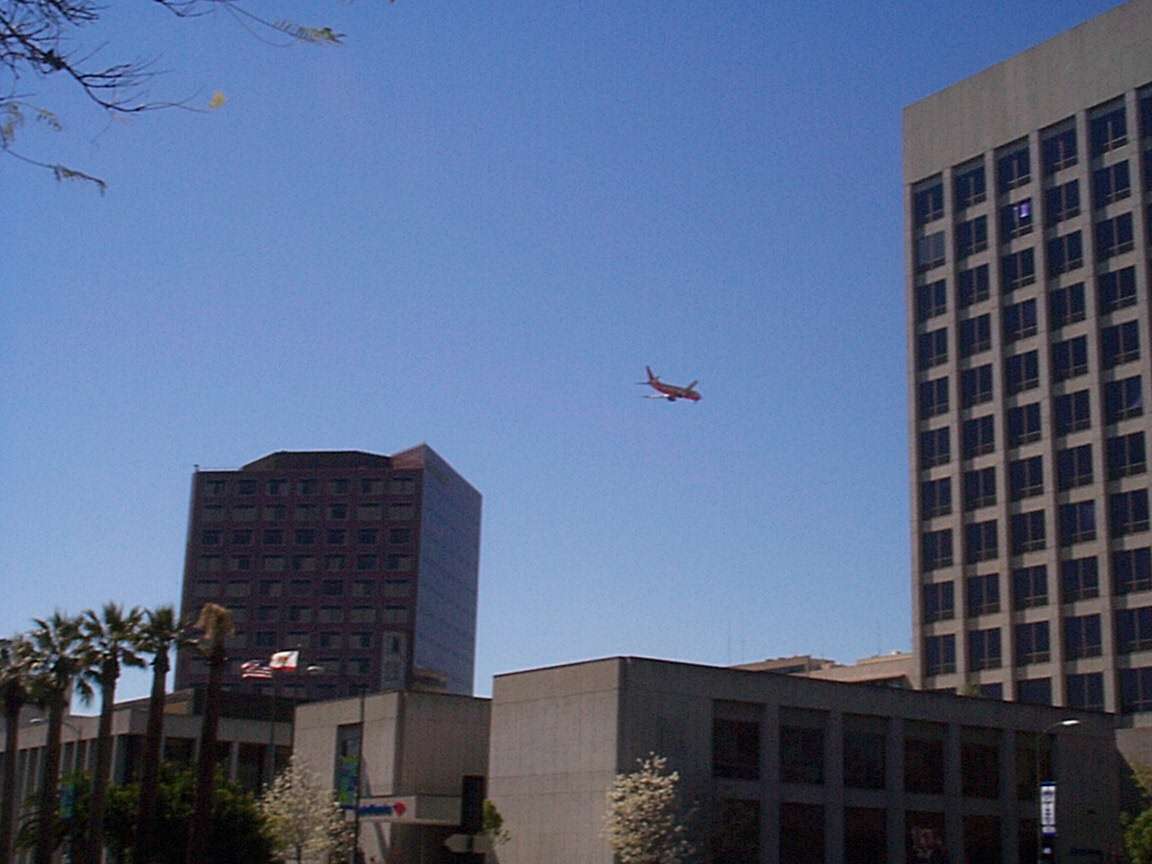 Airplane approaching San Jose airport.